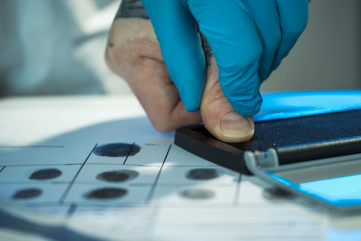 Ink fingerprinting on fingerprint cards